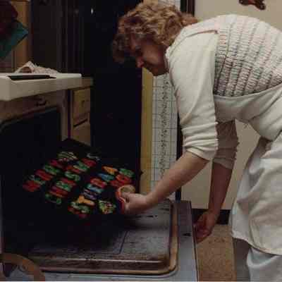 A photo view of a woman baking. 12/11/1989.