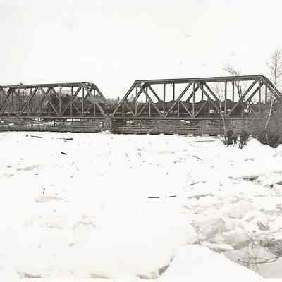 The Black Bridge over the icy Androscoggin River