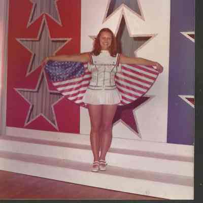 Linda Hinckley showing her costume at rehearsal.