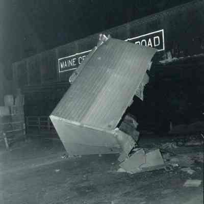 A photo of a fruit truck that hit the Mill Street underpass. 5/13/1955.