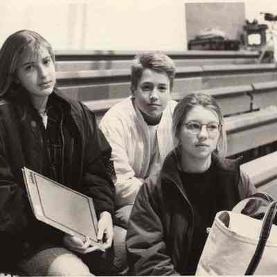 A photo view of three students. 1/7/1992.