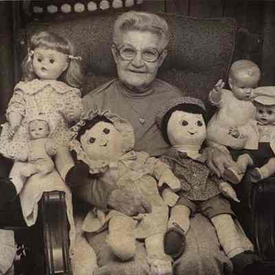 A photo view of Ida Oliver and her dolls. 1/26/1981.