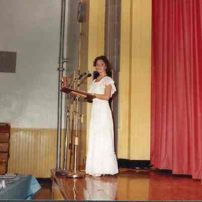 A color photograph of the Mistress of Ceremonies Phyllis Gaudreau Glenn
