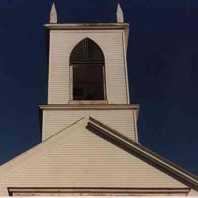 A photo view of a church tower. 1/26/1990.