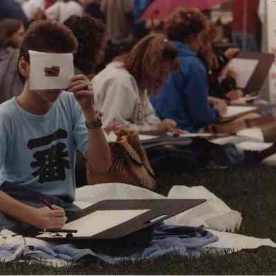 A photo view of people drawing. 9/25/1989.