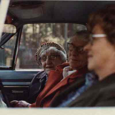 Delia Gamache in a Car