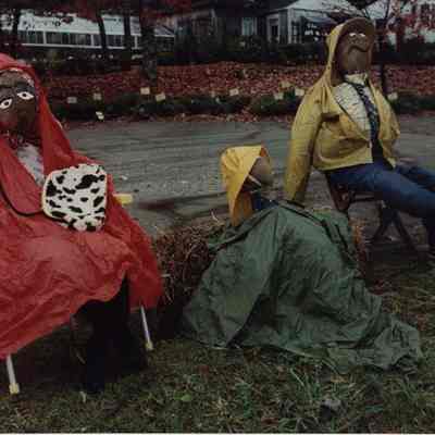 A photo view of two scarecrows. 10/19/1989.