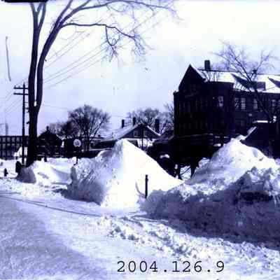 A snowy street scene of Maine Street, Brunswick.