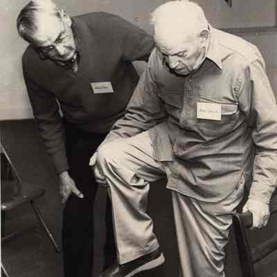 A photo view of two men. 4/7/1992.