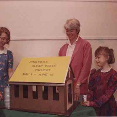A photo view of a woman and two girls. 5/20/1988.