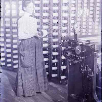A woman working in a factory.