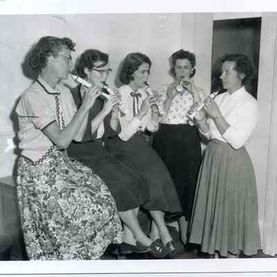 Teachers Demonstrate Flutes used in Music Program