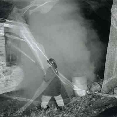 A photo of a fire at Bruce Purington's. 11/7/1956.