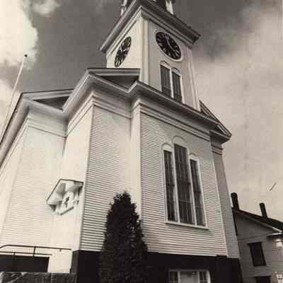 A photo view of a church clock tower. 5/29/1992.