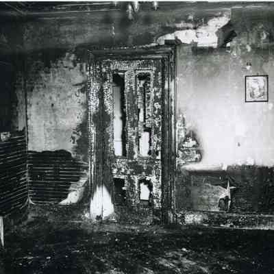 A photo of a burnt out room in Mike Koucalus house fire. 1952