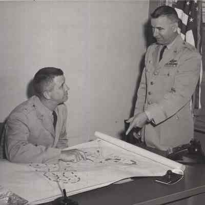 A photo view of Lt. Col. Stanley Podolak and Eric Nicholls. 6/22/1961.