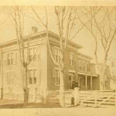 A B/W photographic print of the house at 8 Lincoln Street.