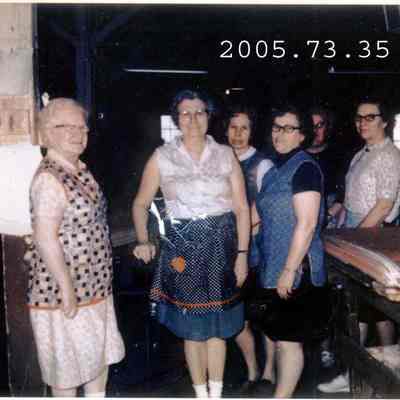 A photo of unidentified mill workers