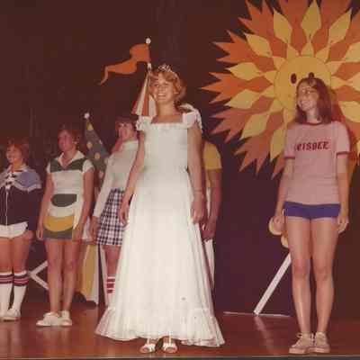 Becky returning from ramp standing center stage