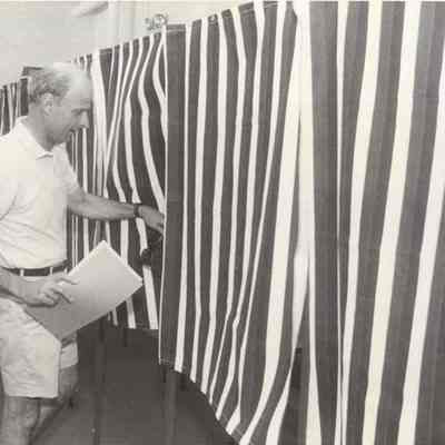 A photo view of a man going to vote. 6/10/1992.