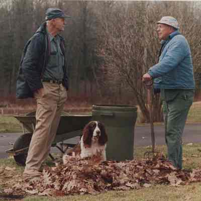 A photo view of two men talking. 4/10/1987.