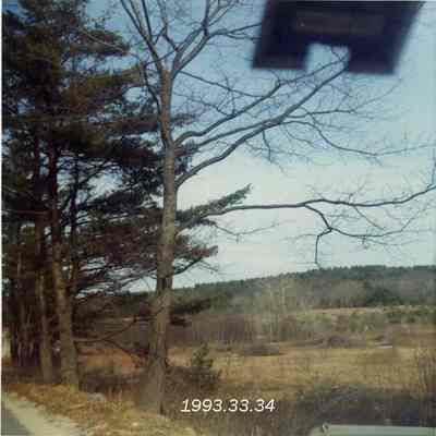 A photo of the field below the Glover's house. 3/1973.