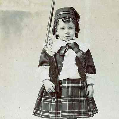 Unidentified child with rifle