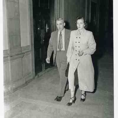 Mrs. Lancelot Cooper and a man walking