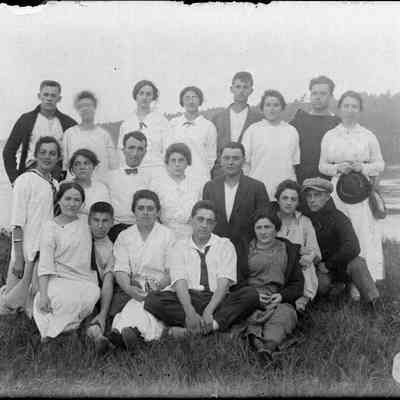 A group of people at the shore.