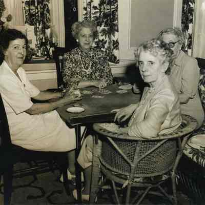 Four Ladies Playing Cards