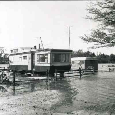 A photo of a flooded Topsham Trailer Court. 9/1/2/1954.