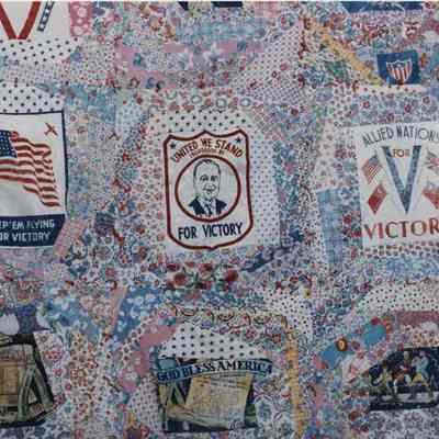 A photo view of a quilt at a PHS exhibit. 3/13/1992.