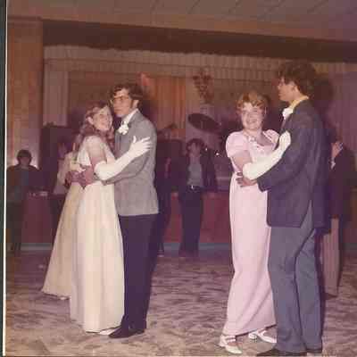 Contestants dancing with their escorts