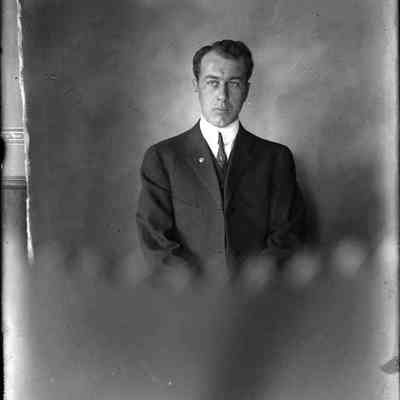 A man in a suit.