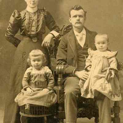 A photo of Joseph & Elisabeth Labbe with daughters.