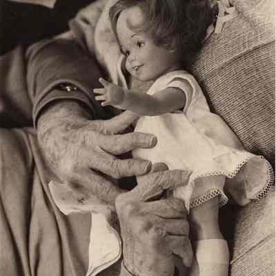 A photo view of Ida Oliver's hands and doll. 1/26/1981.