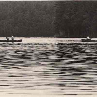 A photo view of people canoeing. 8/18/1992.