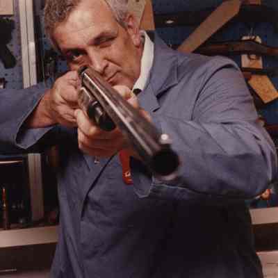 A photo view of a man with a gun. 1/4/1991