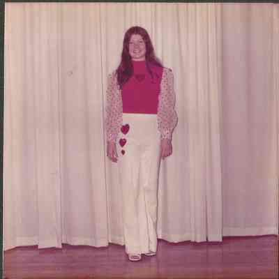 Contestant #5 Debra Jellison posing in her opening number costume.