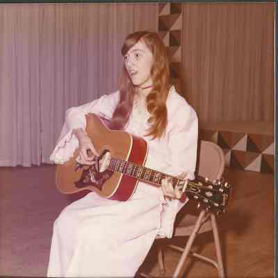 Mary Ann Licameli contestant #4 playing guitar and singing at dress rehersal.