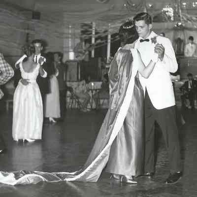 Micheline Paquette & Donald Bisson going off the stage off the Teen Queen Dance.