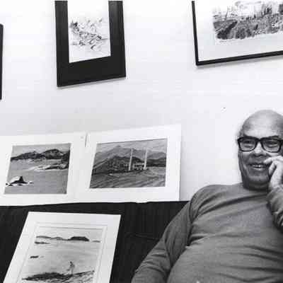 A photo view of an artist (Charlie K.) and his work. 10/22/1992.