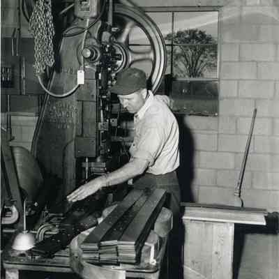 A photo of Lucien Pinette at work.