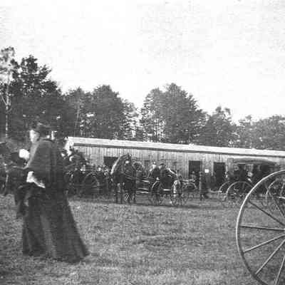 A photo of the barns and crowd at Topsham Fair.