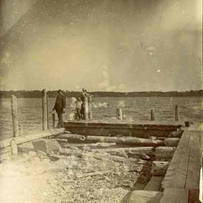 Three men at Simpson's Point, 1898.