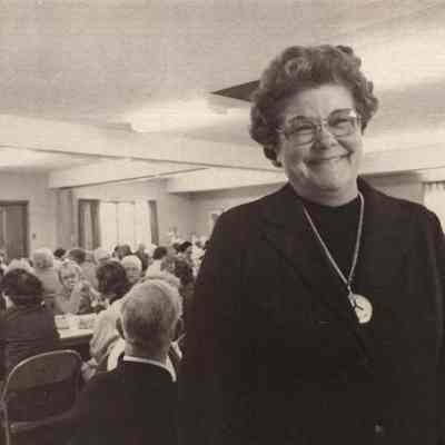 A photo view of Mrs. Merrill at the Toasters Club.