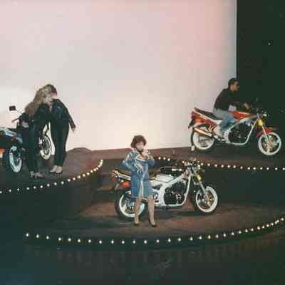 people performing with motorcycles.