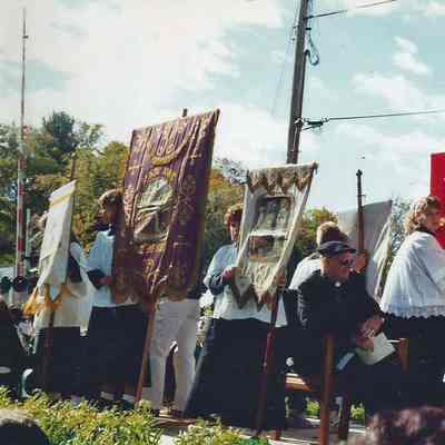 A color photograph of the spectators watching the 250th Annivesary Parade.