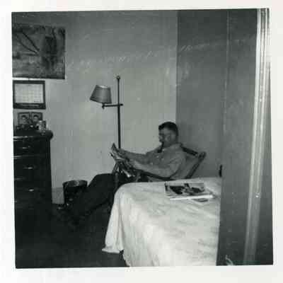 Man Lounging in Chair