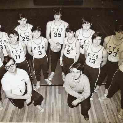 A B/W photographof the CYO ( Catholic Youth Organisation) basketball team.